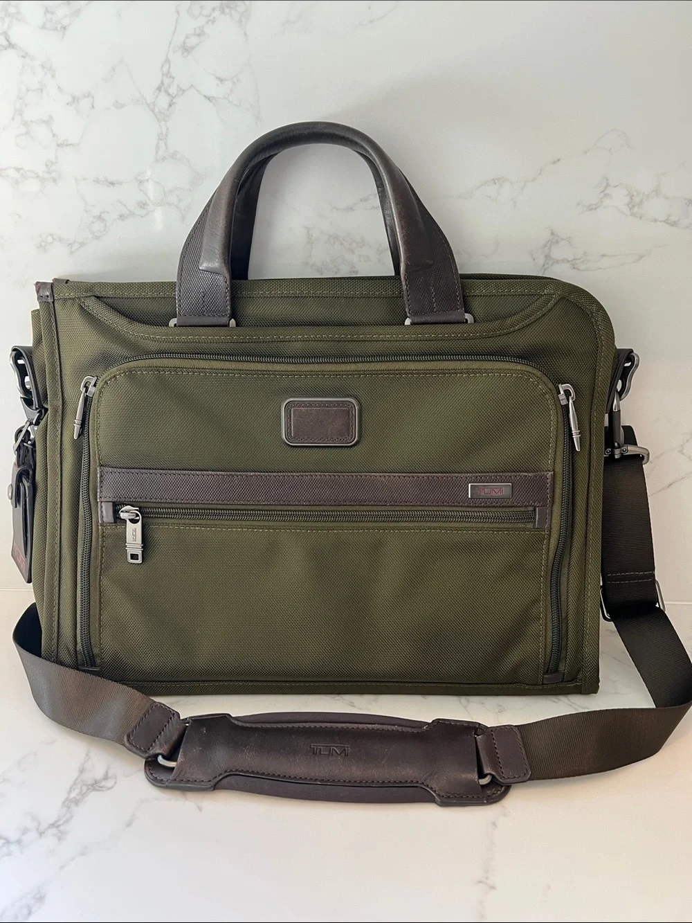 Tumi ultra slim deluxe Portfolio briefcase in Military green. Lightly used.